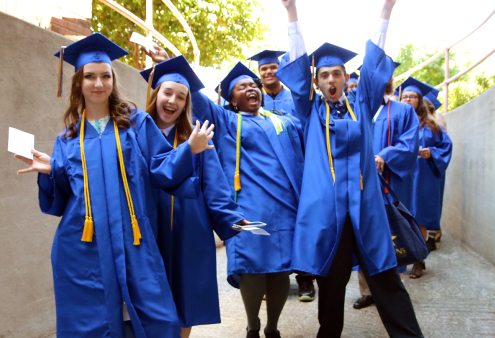 Cheerful graduates of Visions In Education